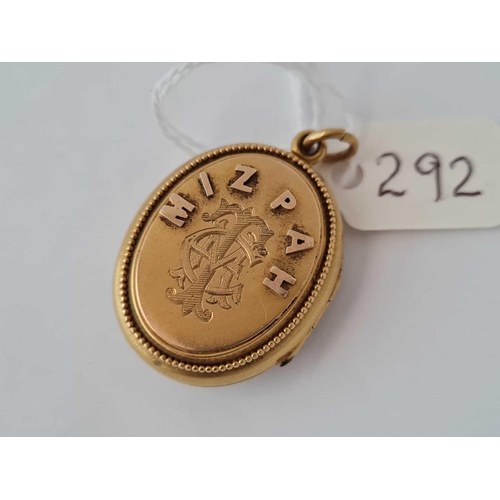 292 - A OVAL MIZPAR LOCKET WITH ANCHOR DESIGN 15CTT GOLD    12 GMS