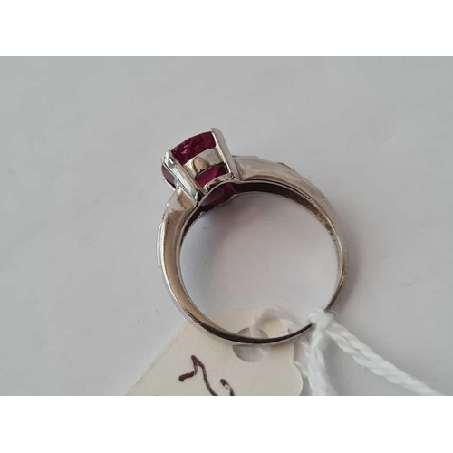 294 - A RUBY AND DIAMOND RING 18CT GOLD SIZE N    4.6 GMS