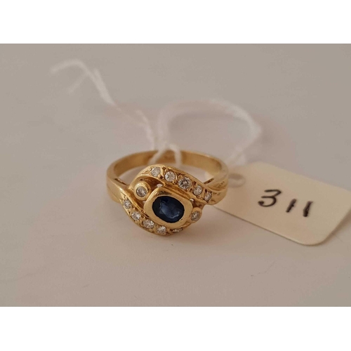 311 - Sapphire & Diamond 18ct crossover ring, size M