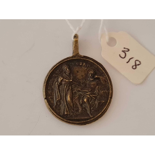 318 - 18th century brass pendant depicting Madonna & child and 2 religious figures to the reverse.