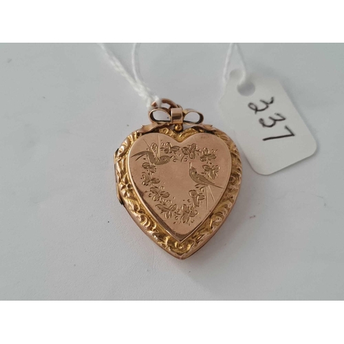 337 - A 9ct back and front locket   4.9 gms