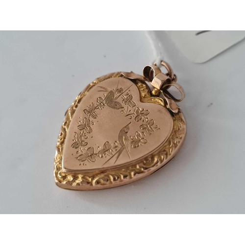 337 - A 9ct back and front locket   4.9 gms