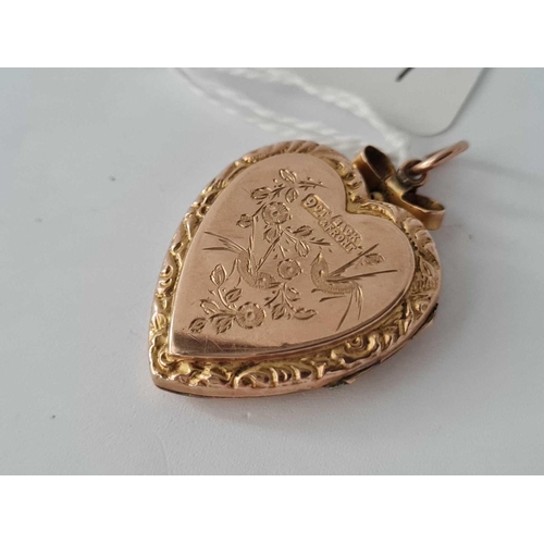 337 - A 9ct back and front locket   4.9 gms