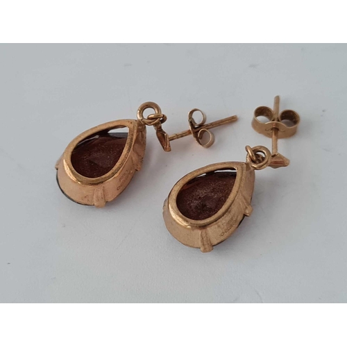 34 - A pair of vintage brown stone 9ct drop earrings 3.6g inc