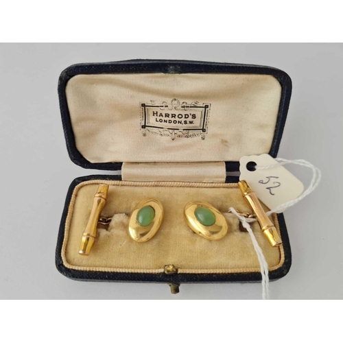 52 - A EDWARDIAN GOLD AND JADE SET CUFFLINKS IN HARRODS BOX