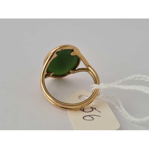 56 - A high carat gold tested Nephrite jade set ring size  O    5.9 gms