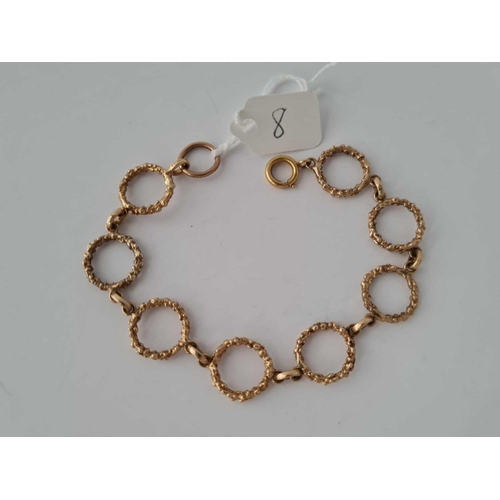 8 - A ANTIQUE EIGHT CIRCULAR LINK BRACELET 9CT 7.5 INCH     12.3 GMS