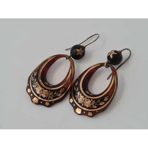 90 - A pair of 19th century pique earrings