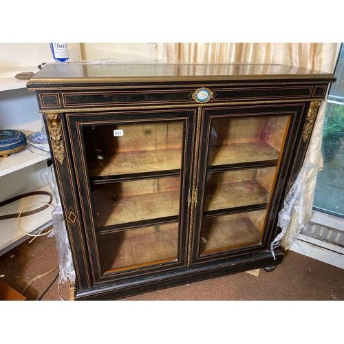 1727 - A Victorian ebonised to door cabinet with Severs panel, 42