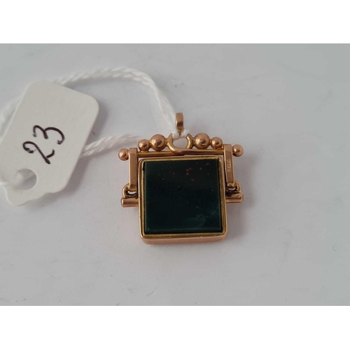 23 - An oblong spinning fob in 9ct