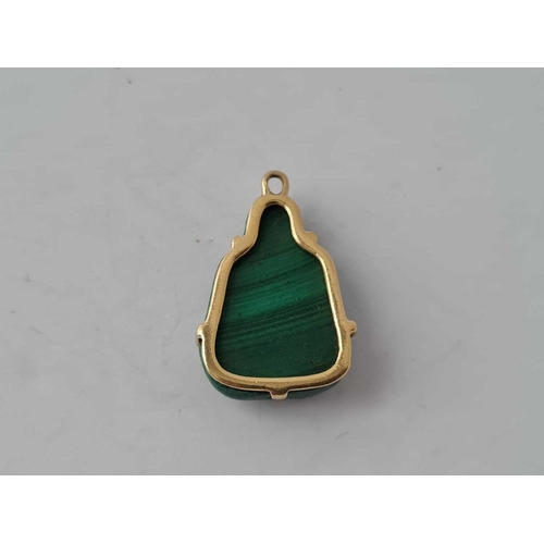 38 - A gold malachite Buddha pendant