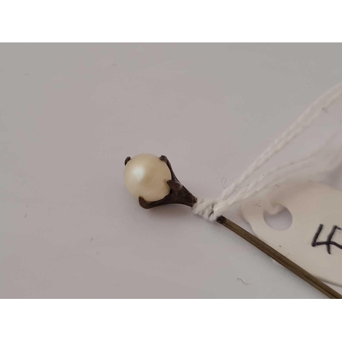 44 - Vintage eagle claw clutching a real pearl stickpin