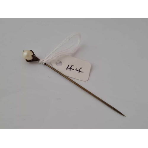 44 - Vintage eagle claw clutching a real pearl stickpin