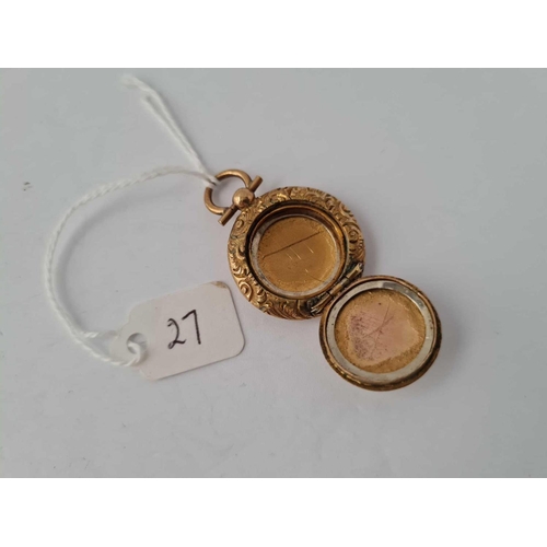 27 - Circular engraved gold B & F locket