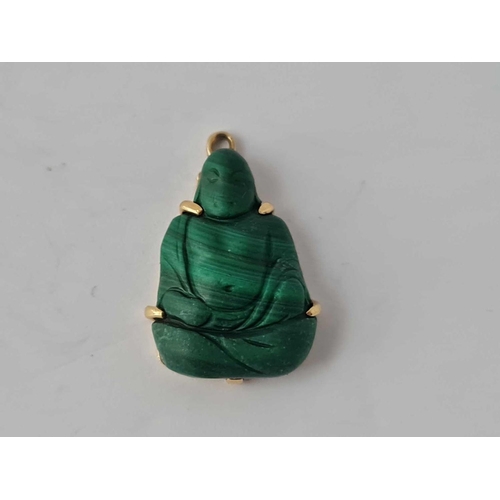 38 - A gold malachite Buddha pendant