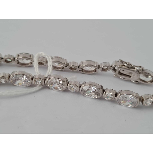 104 - A attractive white stone silver bracelet   7.5 inches   21 gms