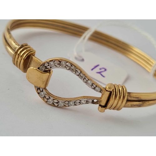 12 - A GOLD BRACELET WITH DIAMOND CLASP ONE STONE MISSING 9CT      13.8 GMS