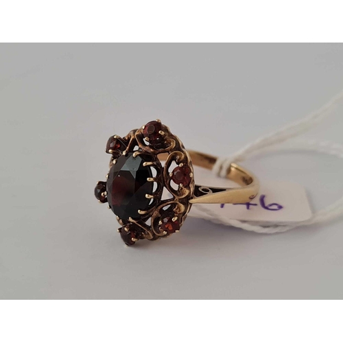 146 - A garnet cluster ring 9ct size M     4.5 gms