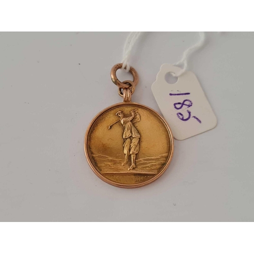 185 - A golf medallion 9ct      8.1 gms