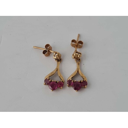 197 - A pair of ruby 9ct earrings