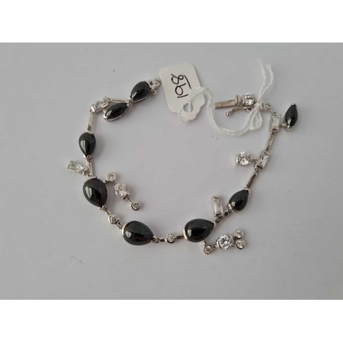 198 - A black and white stone set silver bracelet 17.5g inc