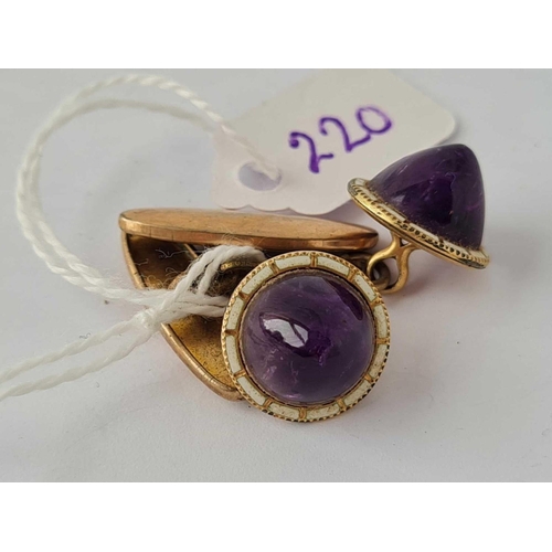 220 - A pair of enamel and amethyst cabochon 15ct gold and metal cufflinks