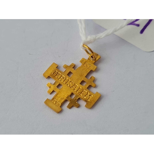 221 - A cross pendant 14ct gold