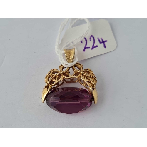 224 - A 9ct amethysts spinning fob