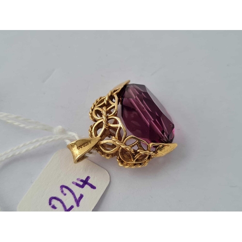 224 - A 9ct amethysts spinning fob