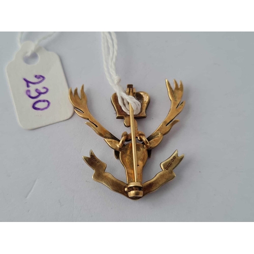 230 - A enamel stags head brooch 9ct    5.1 gms