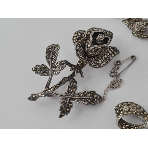 245 - Two silver marcasite brooches and bracelet