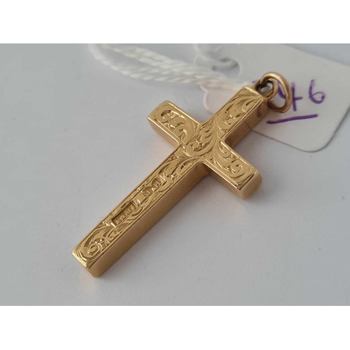 246 - A 18CT GOLD CROSS   11 GMS