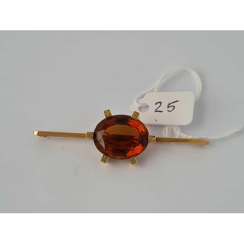 25 - Antique 9ct stamped bar brooch set with a citrine, length 62mm