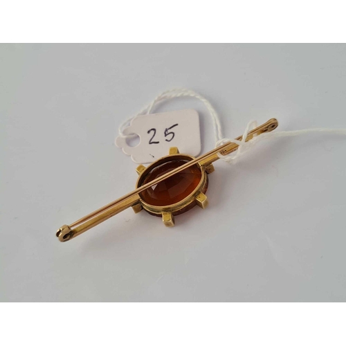 25 - Antique 9ct stamped bar brooch set with a citrine, length 62mm