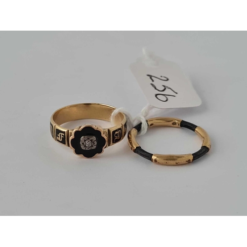 256 - A VICTORIAN GOLD AND BLACK ENAMEL MEMORIAL RING WITH DIAMOND AND ANOTHER GOLD MEMORIAL RING SIZES J ... 