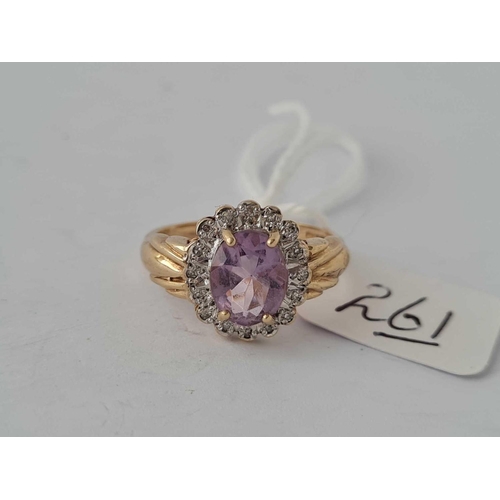 261 - An attractive Amethyst & diamond 9ct cluster ring size O 2.8g