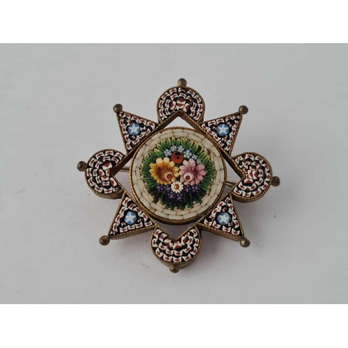 267 - An antique micro mosaic brooch