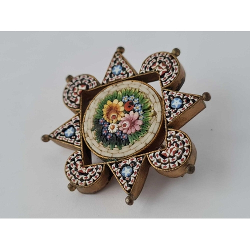 267 - An antique micro mosaic brooch