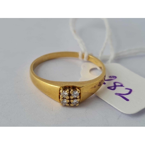 282 - A four stone diamond ring 18ct gold size R    2.9 gms