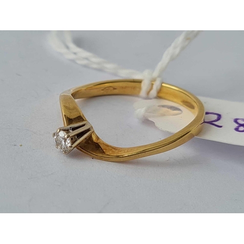 283 - A solitaire diamond  ring with design twist shank 18ct gold size N    2.1 gms