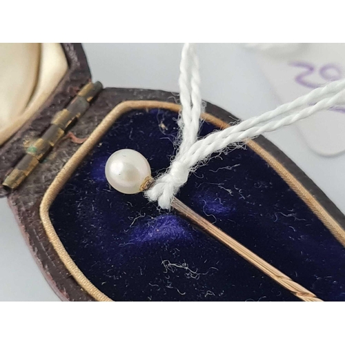 293 - A gold stick pin with pearl top in box