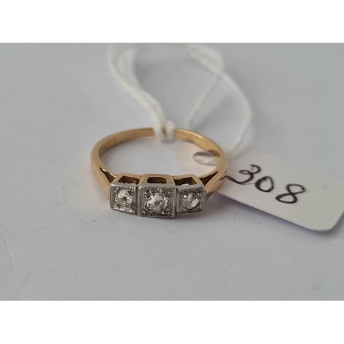 308 - A three stone diamond ring 18ct gold size I     2.3 gms