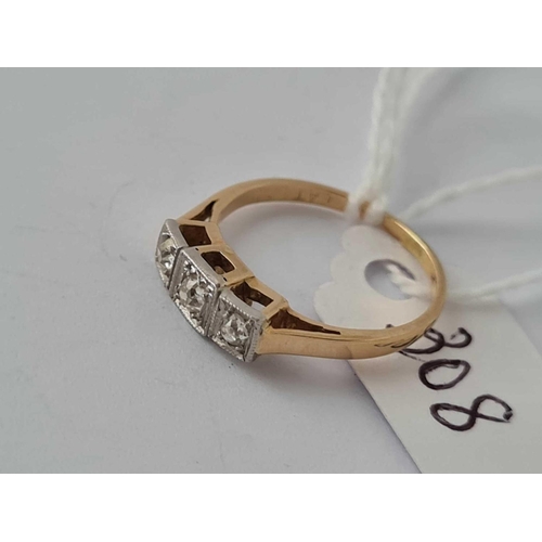 308 - A three stone diamond ring 18ct gold size I     2.3 gms