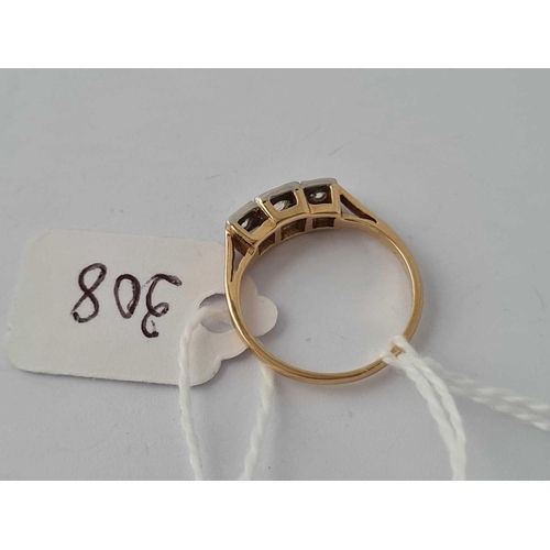 308 - A three stone diamond ring 18ct gold size I     2.3 gms