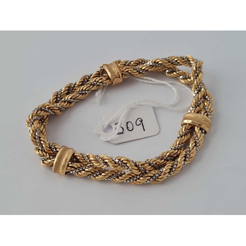 309 - A FANCY TWO COLOUR GOLD TWO STRAND BRACELET WITH SLIDING CLASP 9CT 7.5 INCHES    20.4 GMS