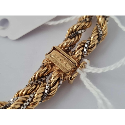 309 - A FANCY TWO COLOUR GOLD TWO STRAND BRACELET WITH SLIDING CLASP 9CT 7.5 INCHES    20.4 GMS