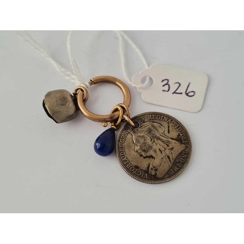 326 - Gold bold ring 17mm diameter suspending a silver bell charm, gold mounted
lapis drop and an 1896 shi... 