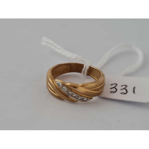 331 - A diamond band ring 18ct gold size N     3.9 gms