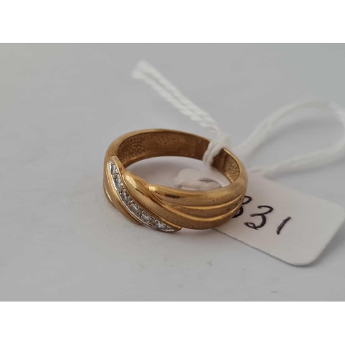 331 - A diamond band ring 18ct gold size N     3.9 gms