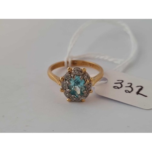 332 - A aquamarine and diamond ring 18ct gold size N    3.7 gms